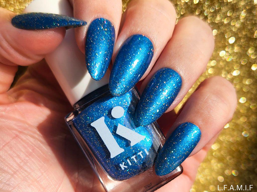 Deep blue holographic nail polish on light skin tone – Looking for a Man in Finance