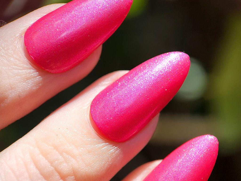 Close-up shimmer texture – Holy P*nk! bold pink indie polish