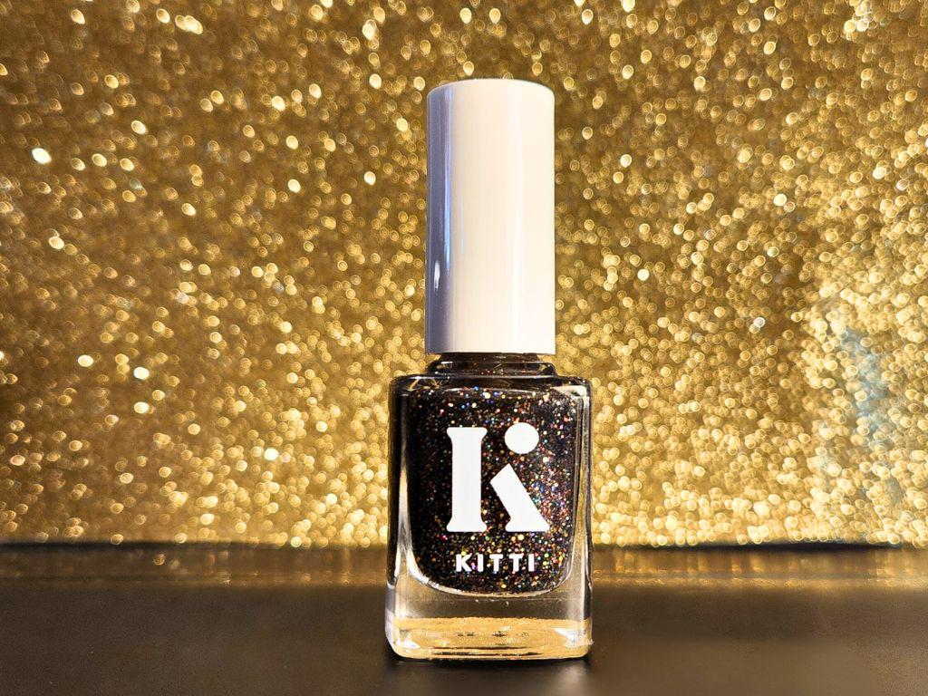 Vegan black glitter nail polish bottle shot – Chaos Era indie polish