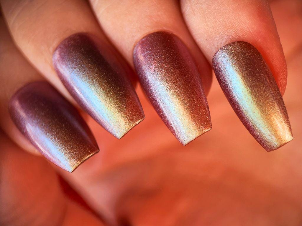 Multichrome nail polish swatch – deep purple green pink finish