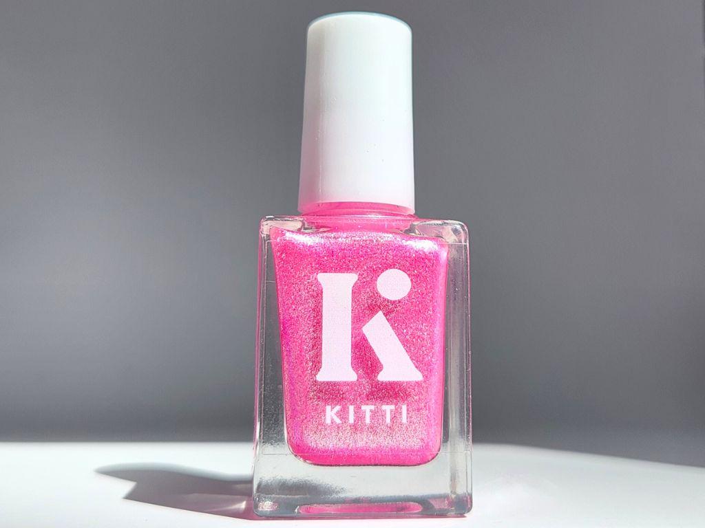 Glow Show nail polish bottle – sheer hot pink indie polish with blue-green shimmer