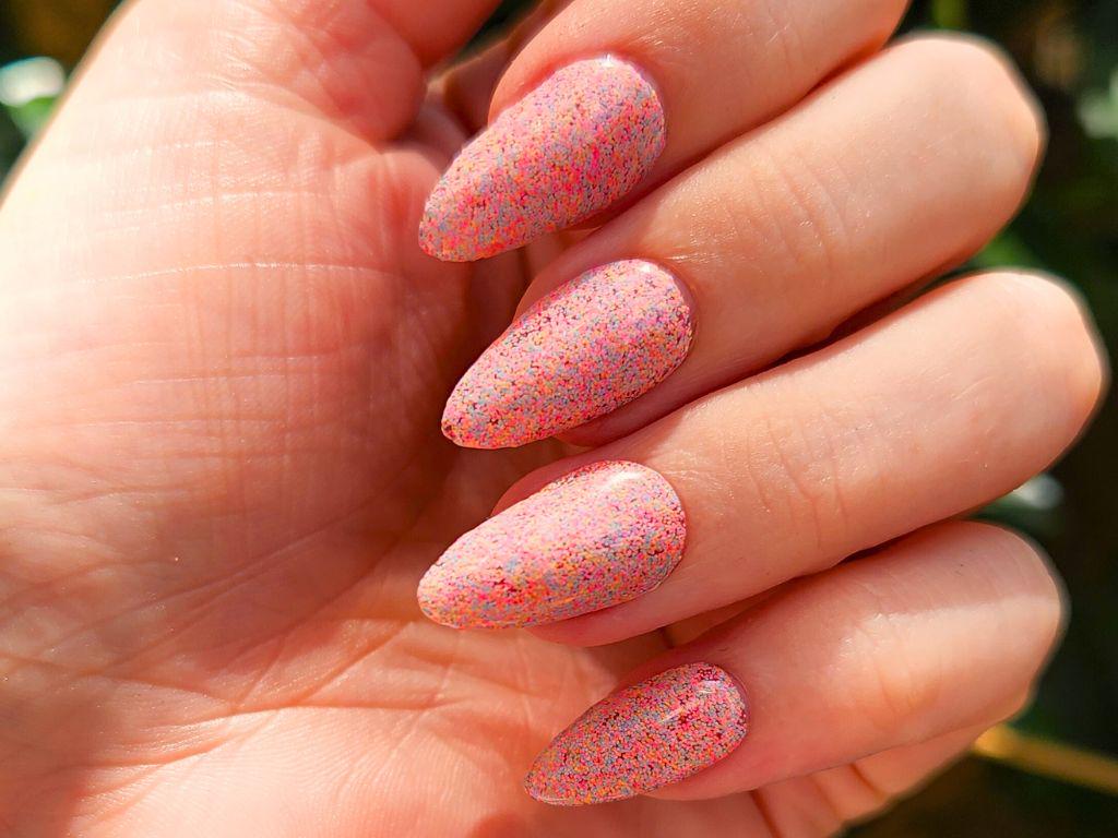 Fairy Bread nail polish swatched on light skin – pastel sprinkle glitter