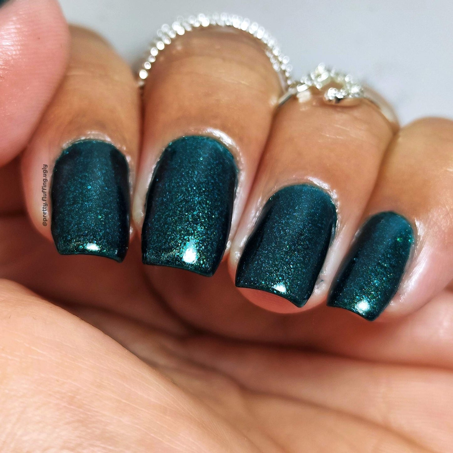 Indie nail polish swatch on deep skin tone