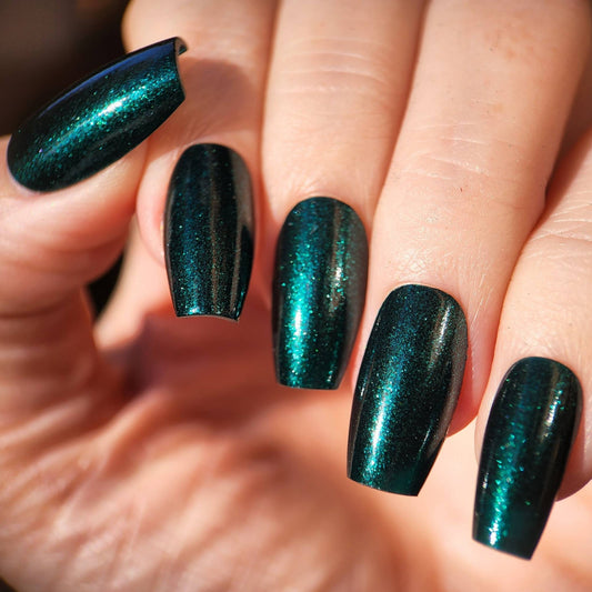 Witchy green jelly nail polish with shimmer