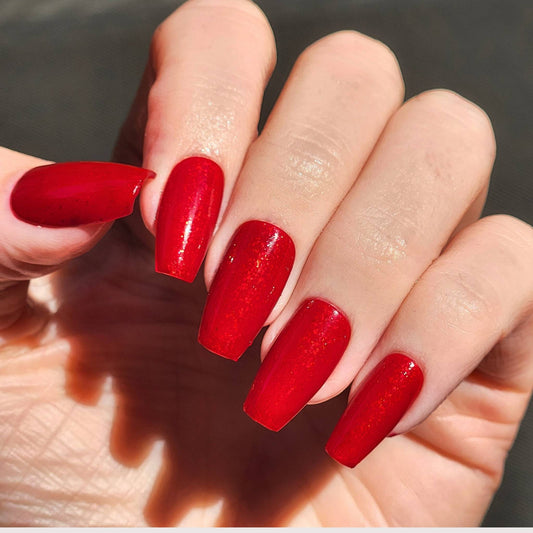Thermal red nail polish with gold flakes – Pretty & Possessed