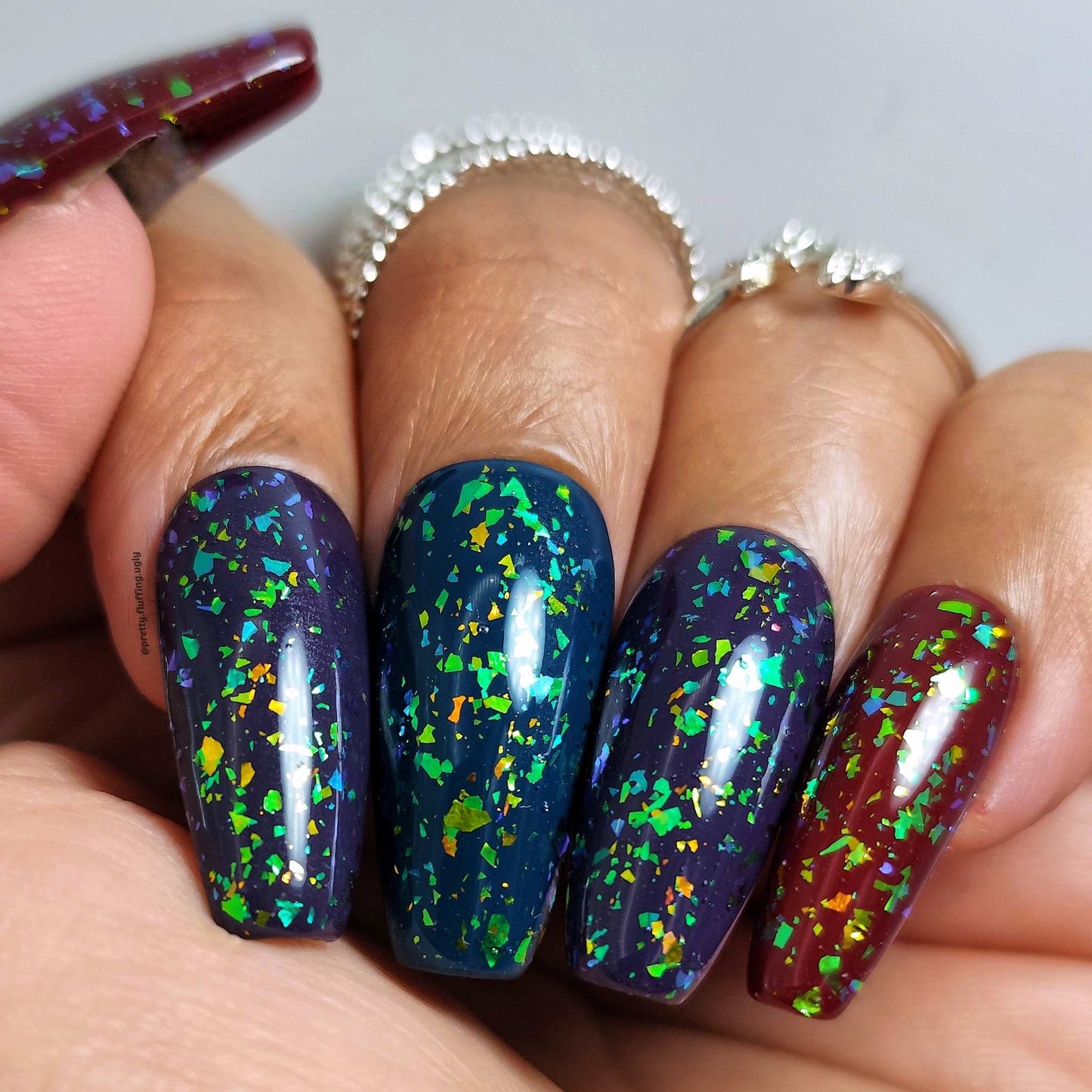 topper nail polish on dark skin tone