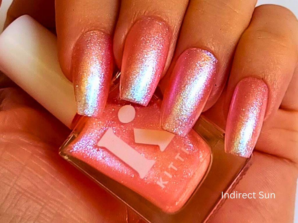 Handmade non-toxic polish bottle – peach shimmer with blue-purple sparkle