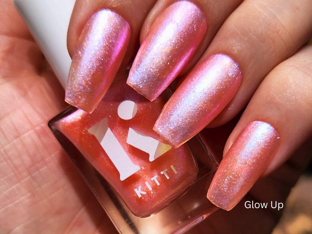 Glow Up bottle shot – sheer coral peach nail polish with shimmering shift
