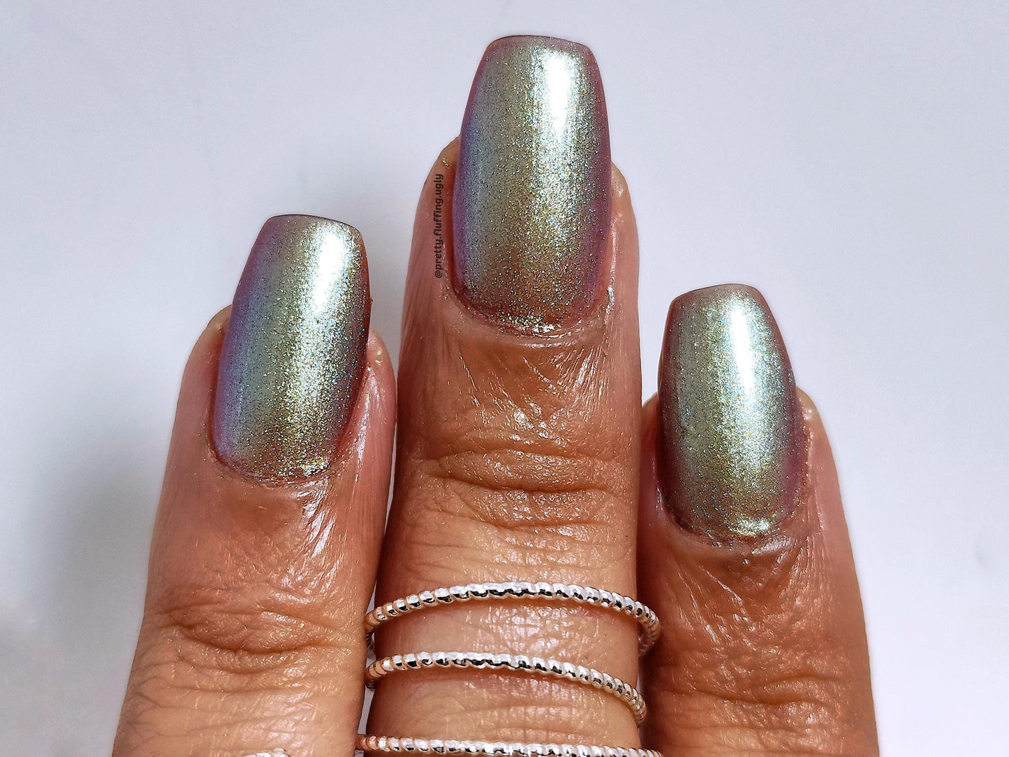 Multichrome nail polish swatch – deep purple green pink finish