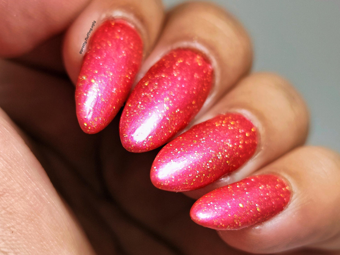 Holographic hot pink nail polish on deep skin tone – Kitti Nails swatch