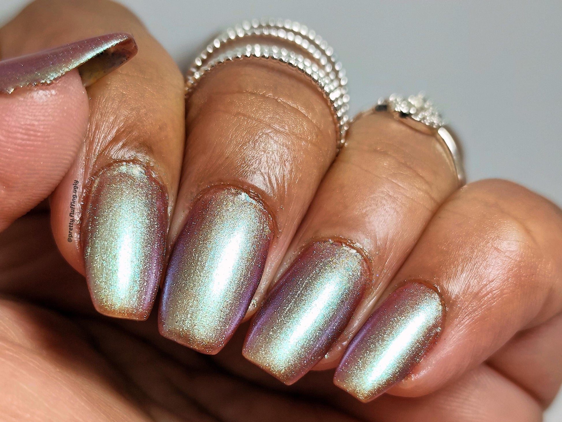 Shifting purple to green polish on dark skin – Turn of the Fall