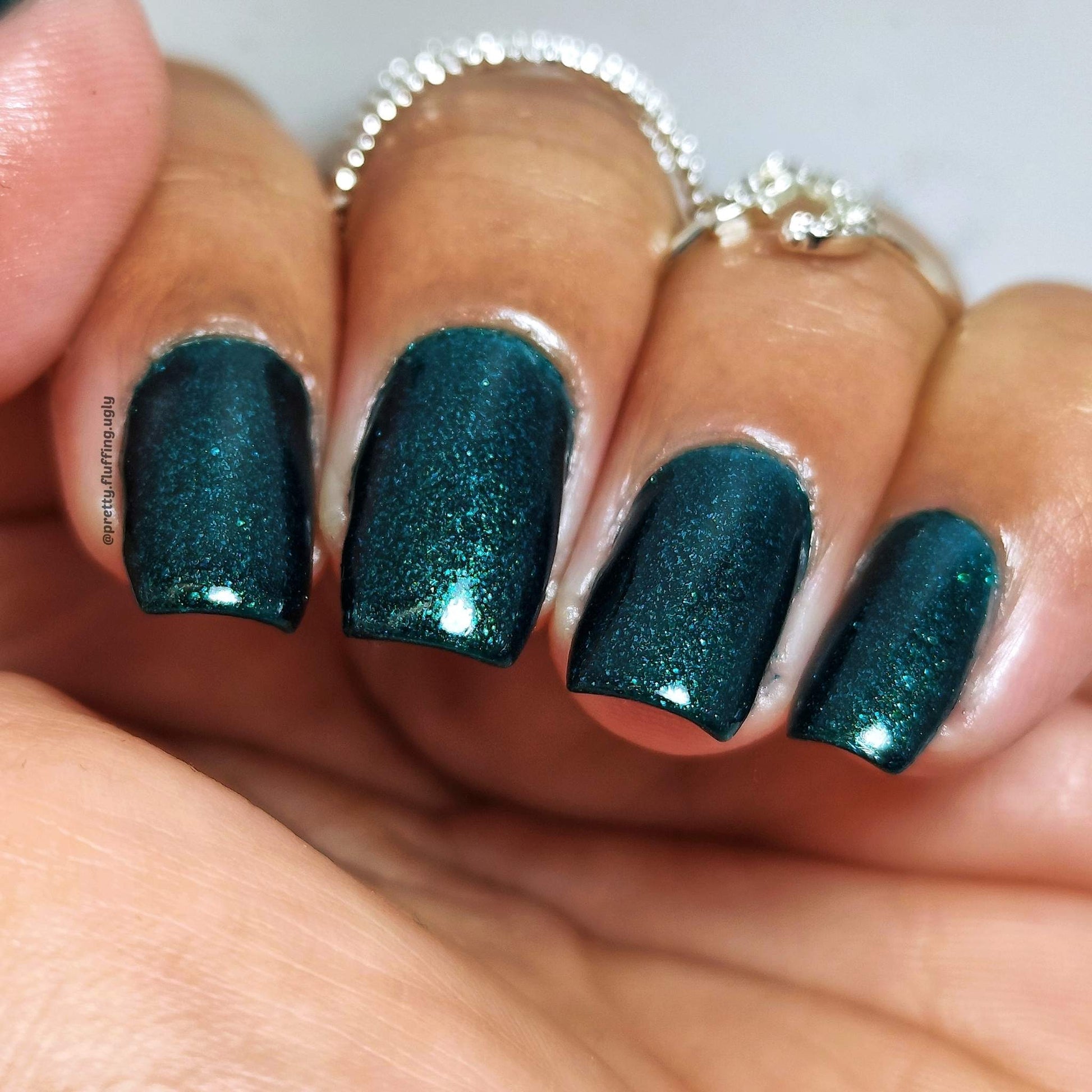 Indie nail polish swatch on deep skin tone