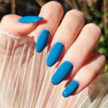 Long-lasting vegan mid-blue polish swatched on nails – Ocean Drive by Kitti Nails