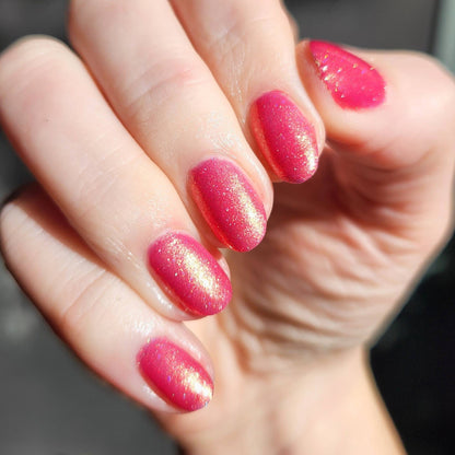 Glossy pink shimmer manicure – indie Australian shifting shimmer polish