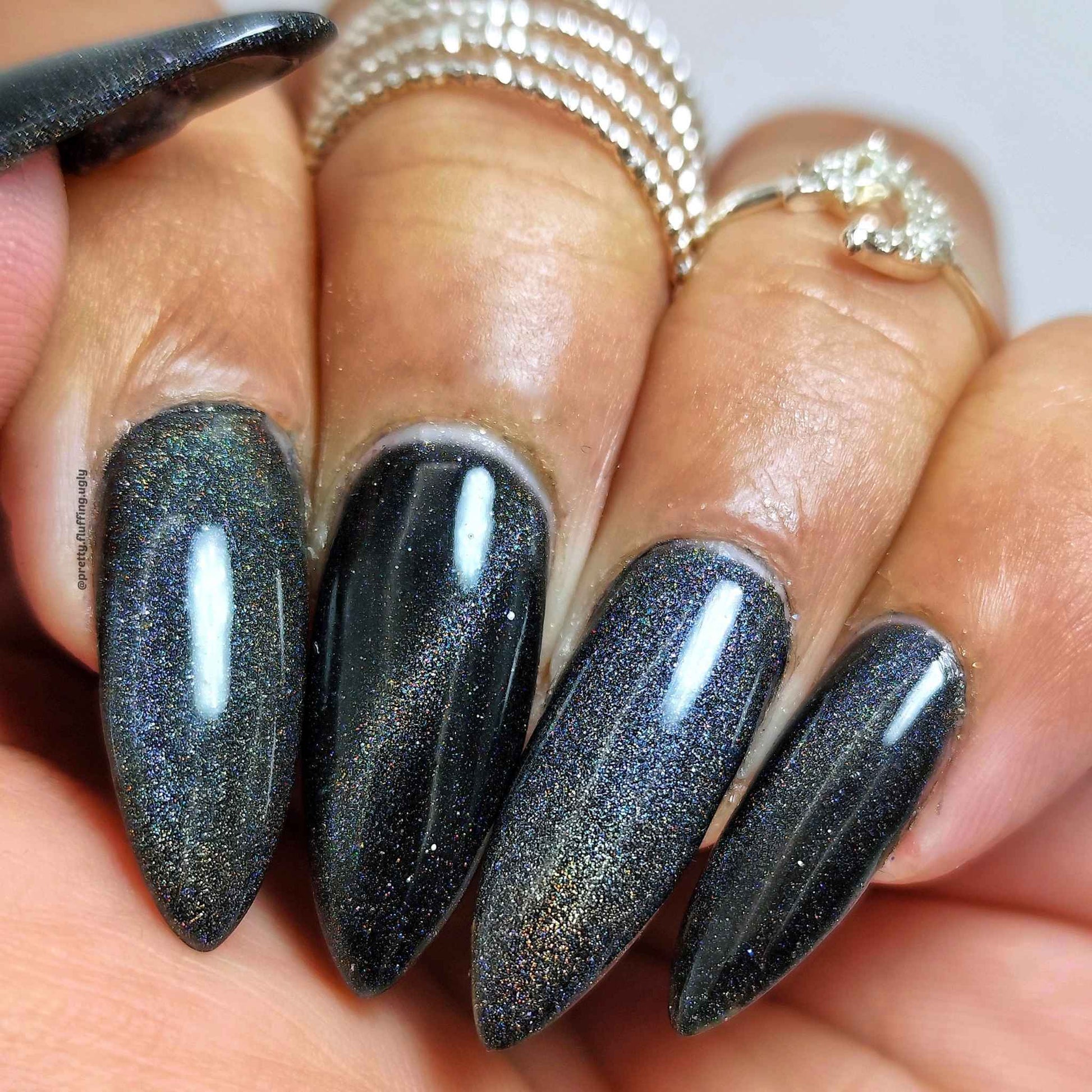 Clouds in My Cauldron polish on nails with shifting light effect