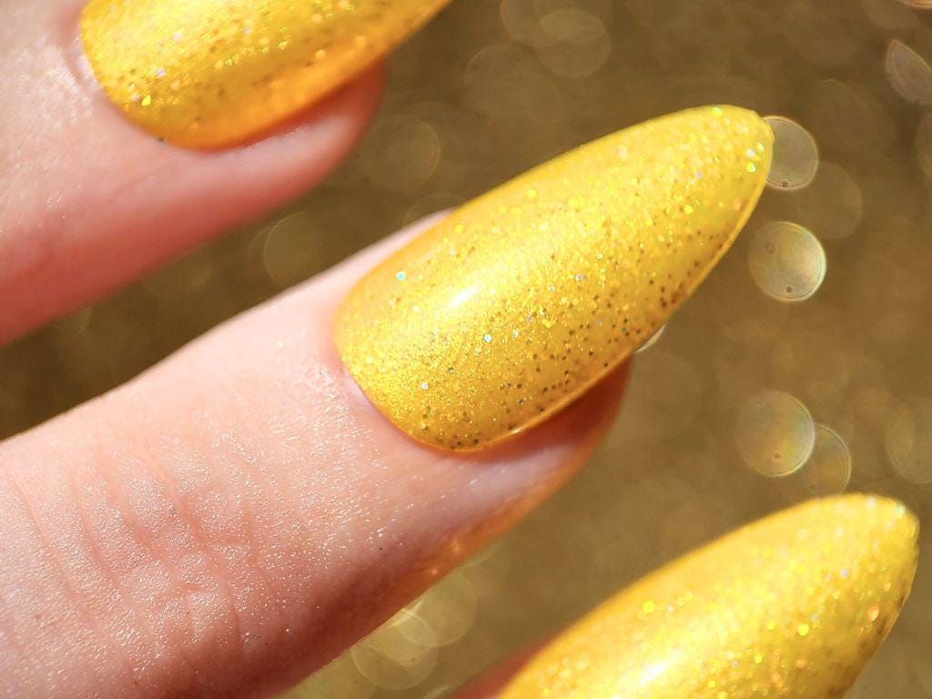 Detail of Swipe Right for Mayhem glitter – vegan, cruelty-free yellow shimmer polish