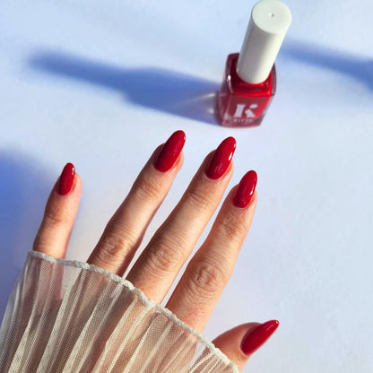 Poppin' Cherries nail polish styled for DIY manicure lovers – glossy red shade