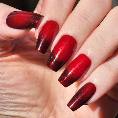 Vegan thermal polish with red color change and gold micro flakes