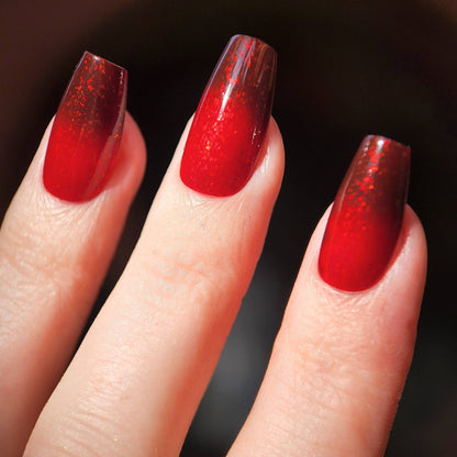 Indie thermal nail polish with gold flake finish