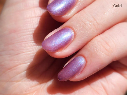 Close-up of shimmer in Beach Please thermal nail polish