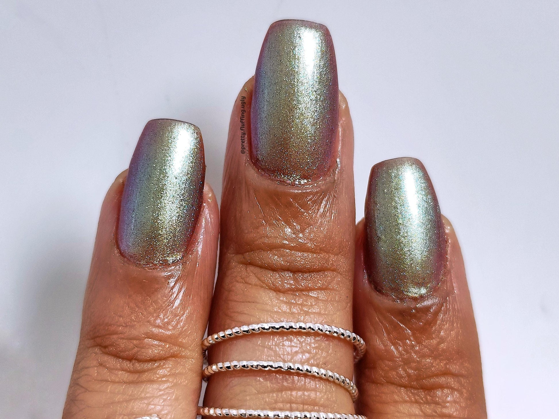 Multichrome nail polish swatch – deep purple green pink finish