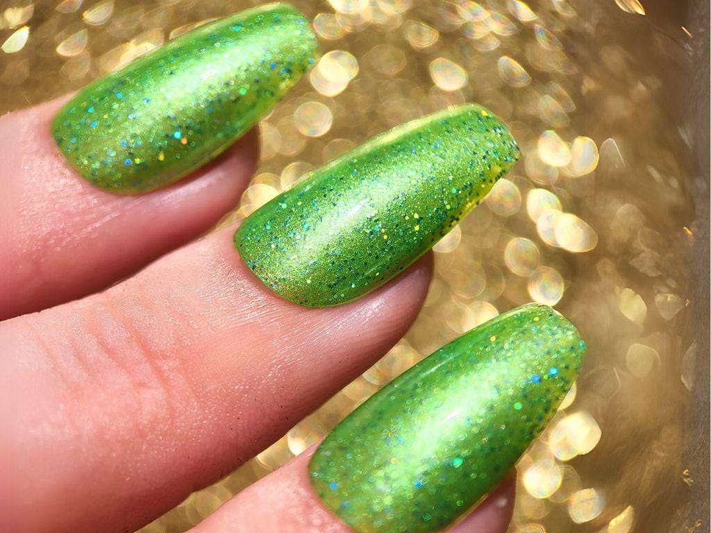 Close-up macro of Feral at Heart – blue holographic shimmer detail
