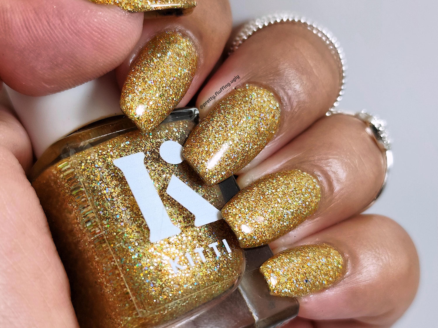 Holographic glitter polish swatch on medium skin – Kitti Nails