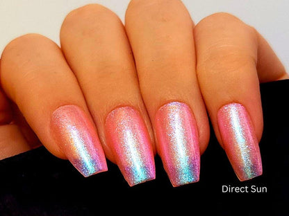 Macro of Glow Up polish – close-up of peach base with cool shimmer particles